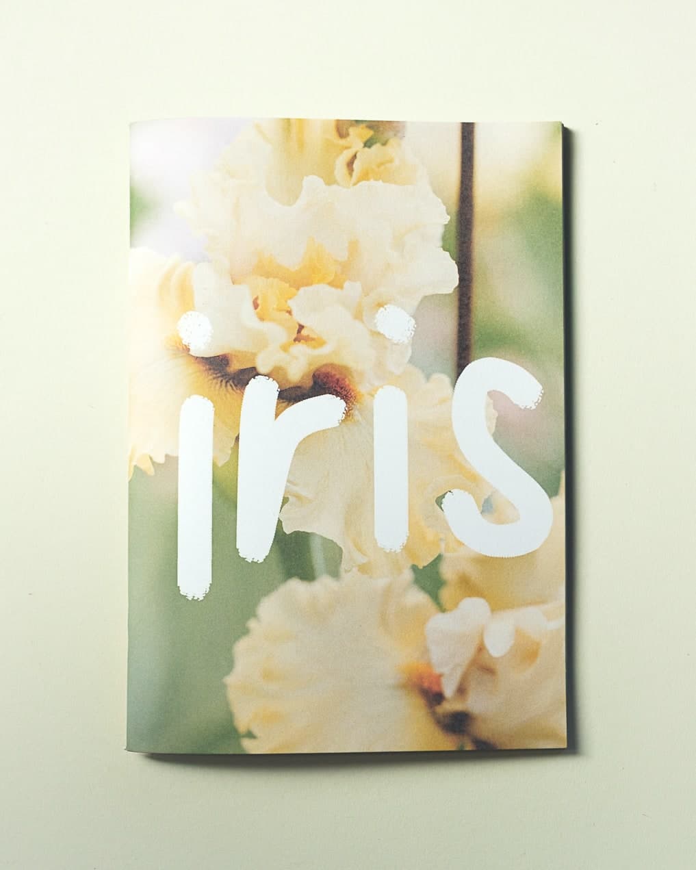 Book cover featuring a photograph of an iris